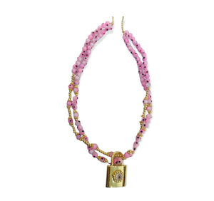 Pink necklace with padlock and little eyes